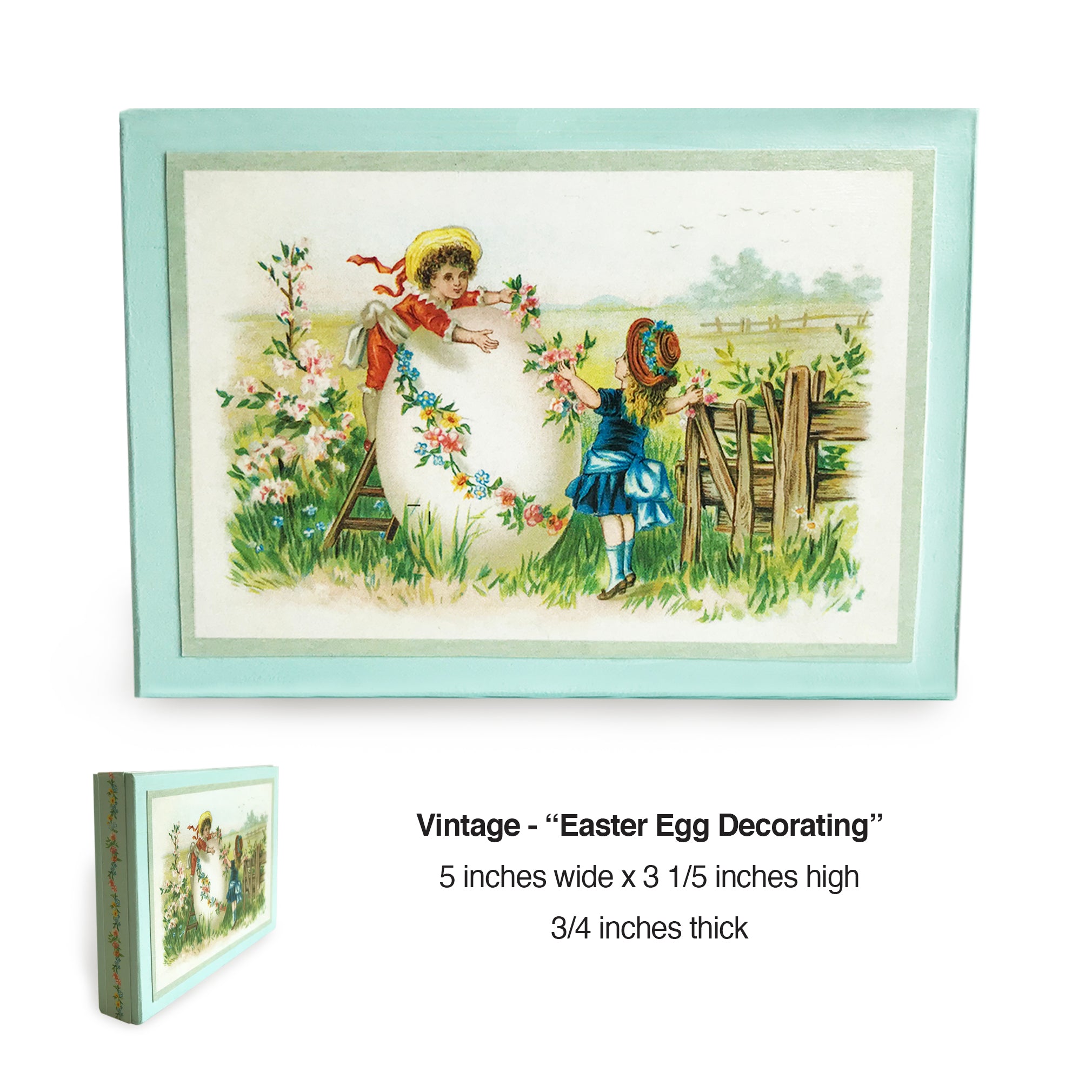 Elegant vintage-inspired Easter wood block made with end-of-19th-century postcard. Decorate your home or gift to a friend this elegant reminder of what it was like to send Easter postcards to relatives and friends! Reproduced vintage “Easter Greetings” postcard. Easter Vintage Decorations. Elegant illustration features young girl and boy decorating an Easter egg in the meadow. Easter egg garland on postcard used to create elegant border on sides of wood block. tribegift.com